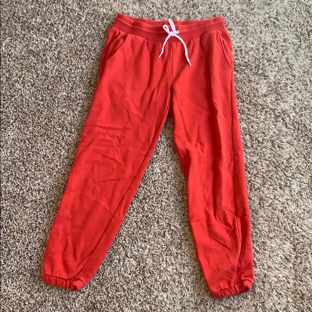 Red sweatpants